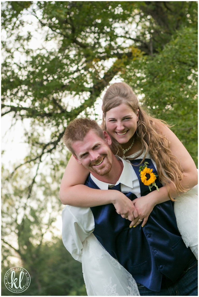 A rustic outdoor farm wedding with bright pops of color by Denver wedding photographer Kristina Lynn Photography & Design.