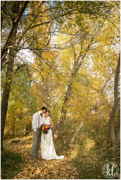 A stylish yet casual wedding couple look for an outdoor wedding | Dress by Maggie Evans Designs | Floral by Bella Lu Floral | Photography by Kristina Lynn Photography & Design | Denver, Colorado