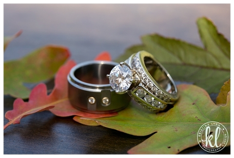 Wedding ring set on fall leaves by Denver wedding photographer Kristina Lynn Photography & Design