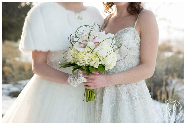 Two beautiful brides say I Do in a winter wonderland | Photographed by Denver Colorado wedding photographer Kristina Lynn Photography & Design
