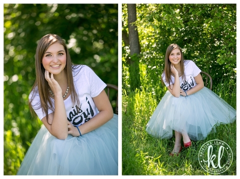 Soft blue tulle skirt with a graphic tee and red heels