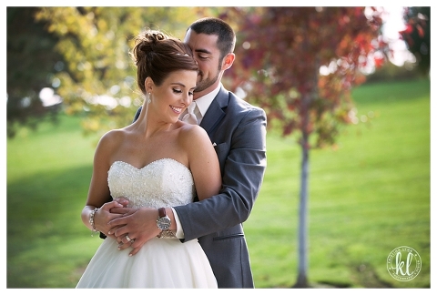 A fall wedding image with bright vibrant colors | Image by Kristina Lynn Photography & Design