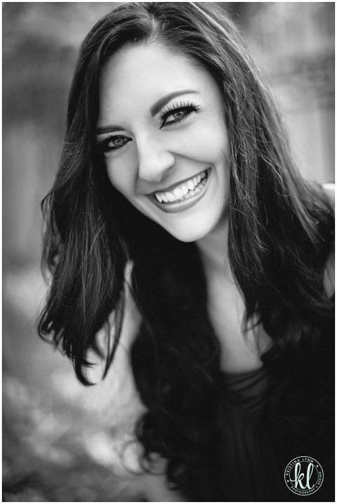 Editorial style black and white model head shot.