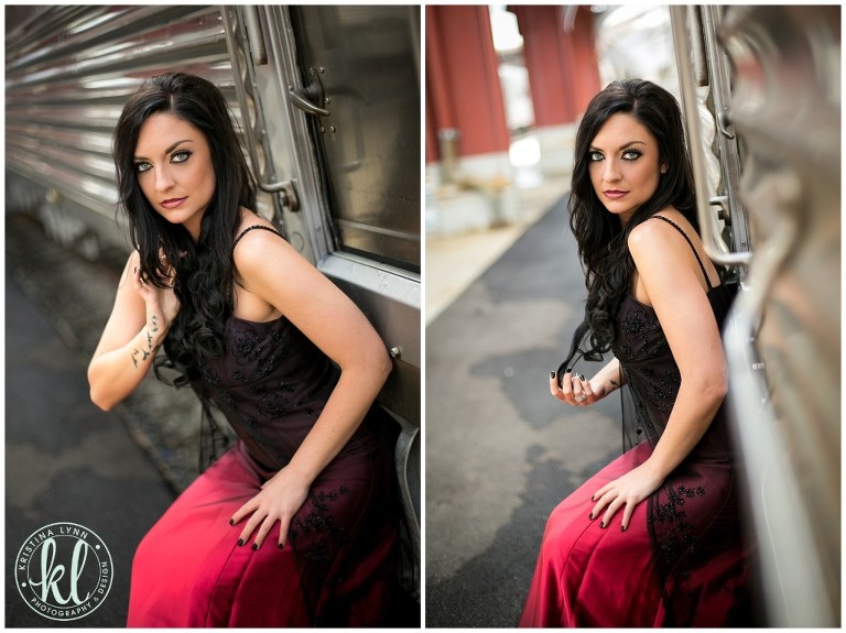 Seductive model posing in a black and red dress in an urban session in Denver, Colorado.