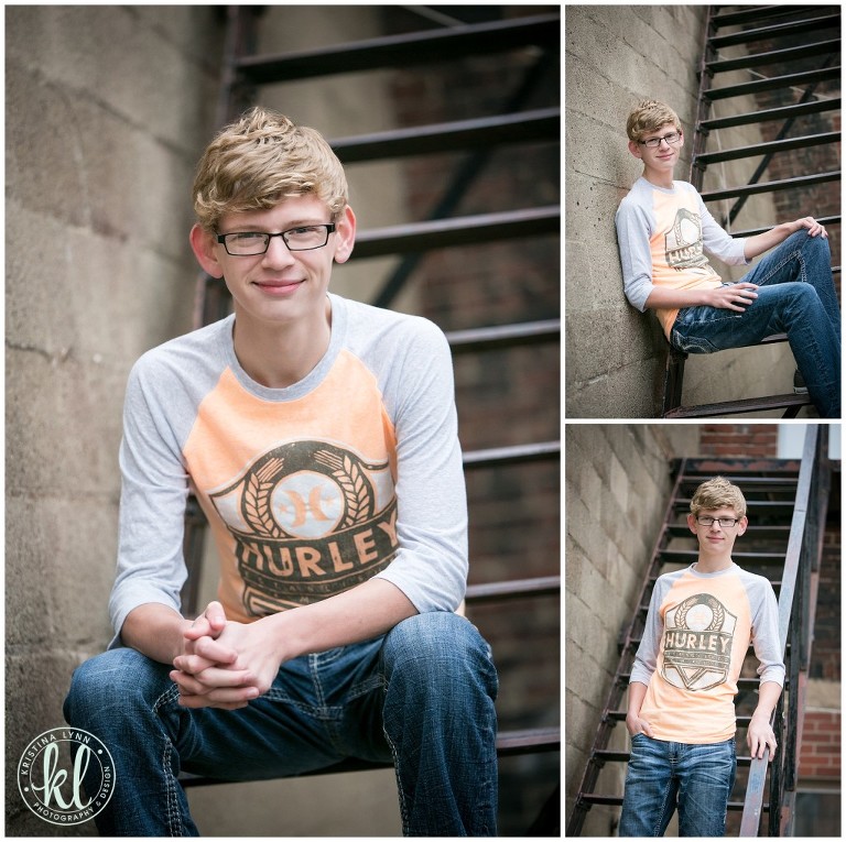 High school senior boy wearing a Hurley graphic tee in an alleway for his senior photos | Image by Kristina Lynn Photography & Design