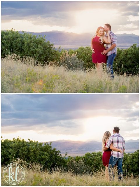 A couple watching the sun set over the Rocky Mountains in Denver, Colorado.