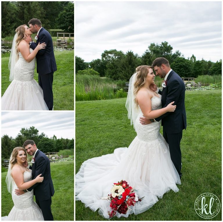 The bride in her Allure dress from Pure Bridal, and the groom in his navy suit from the Mensware House, take a moment to themselves at Reiman Gardens in Ames Iowa.
