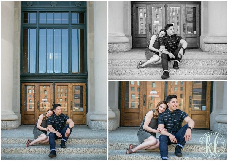 Couple sitting in front of large wooden doors at Union Station in Minnesota.