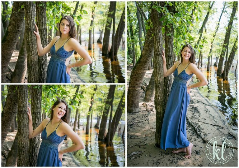 teenager girl posing by the st croix river for graduation photos