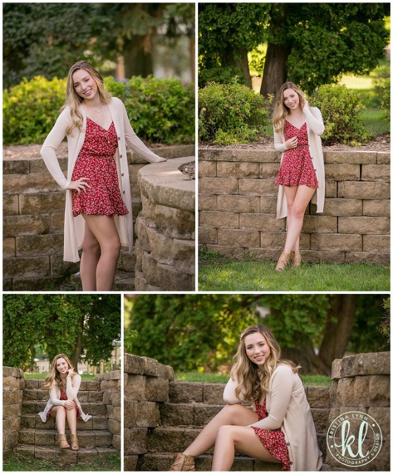 high school senior girl in a red romper in a park