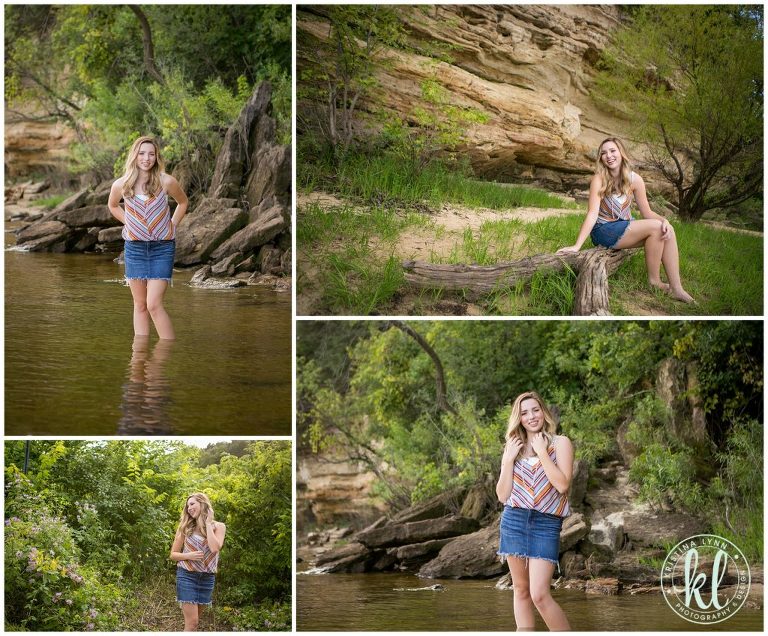 high school senior girl standing in park along the st croix river