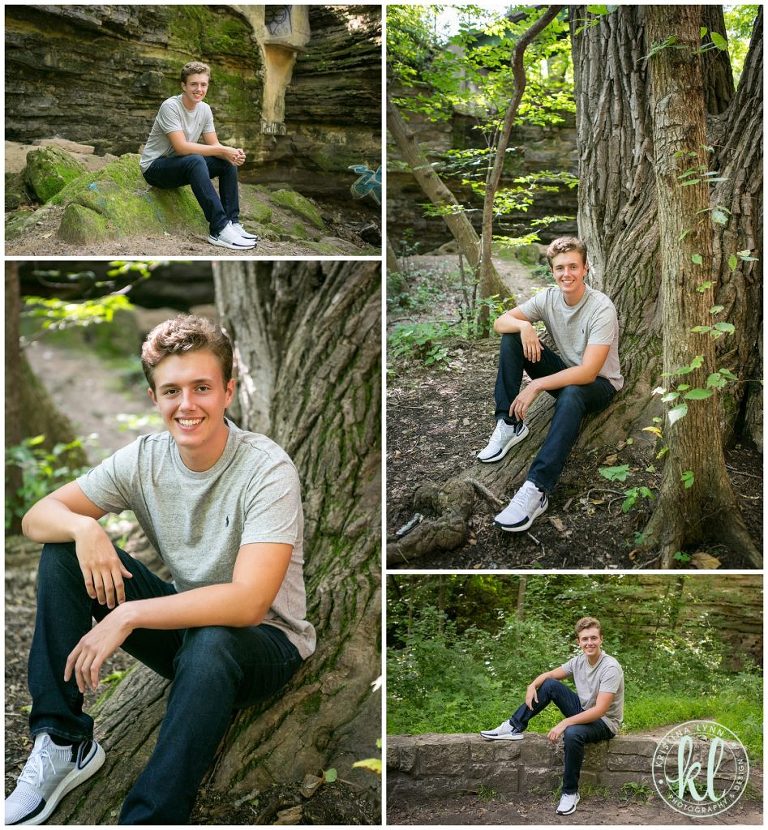 high school senior guy sitting in wooded area