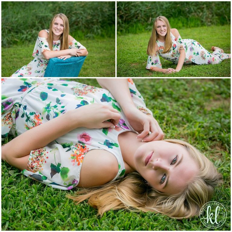 teenage girl laying in grass for senior photo session