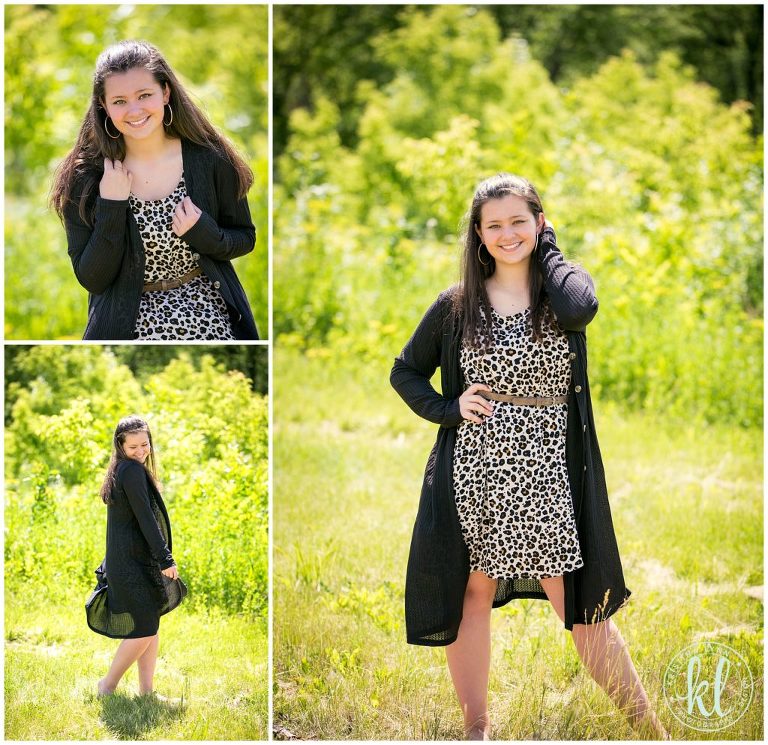 high school senior photos in lush green field with trees