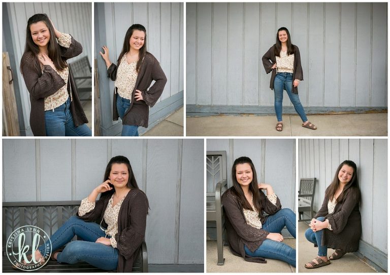 girl posing for senior photos outside a building in clarion iowa