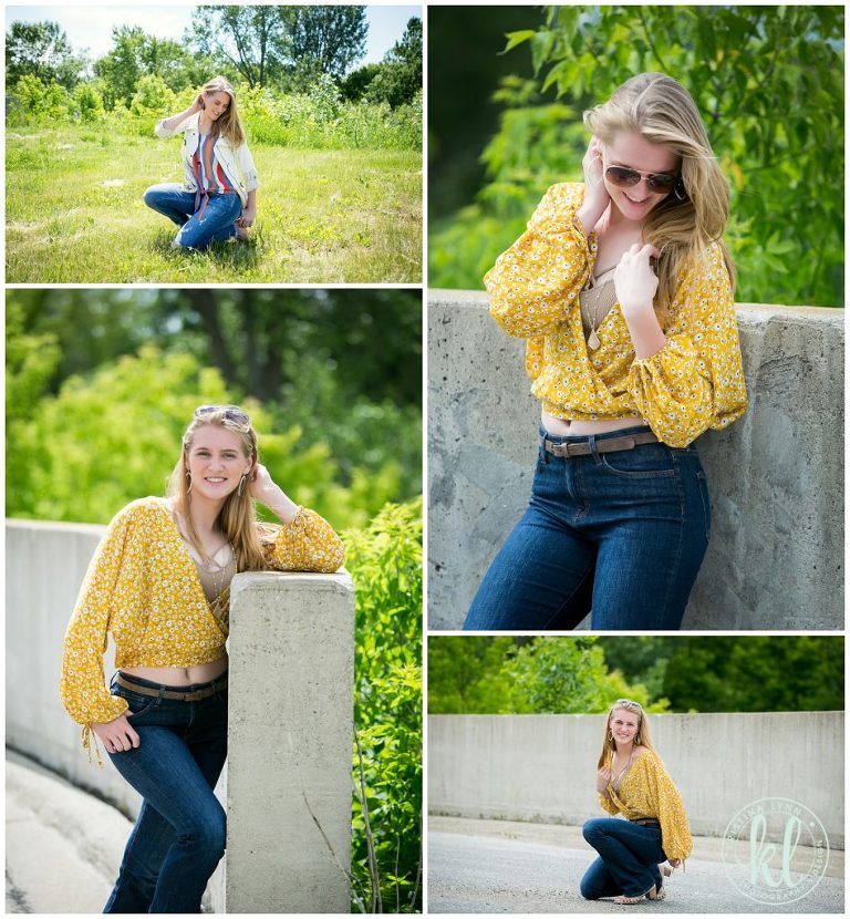 high school senior girl posing by a cement wall in mason city iowa