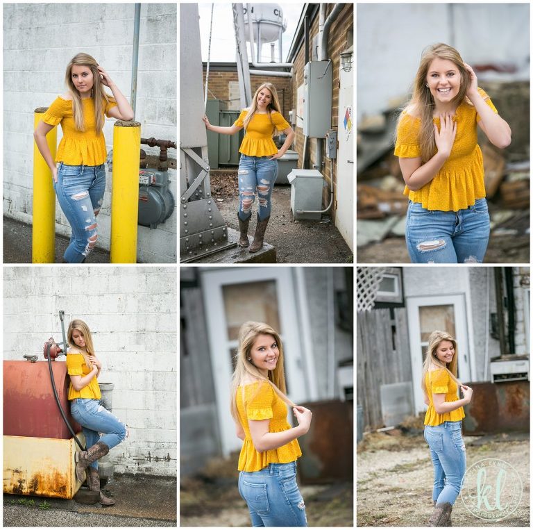 senior pictures of girl in yellow top in an alleyway in clarion iowa