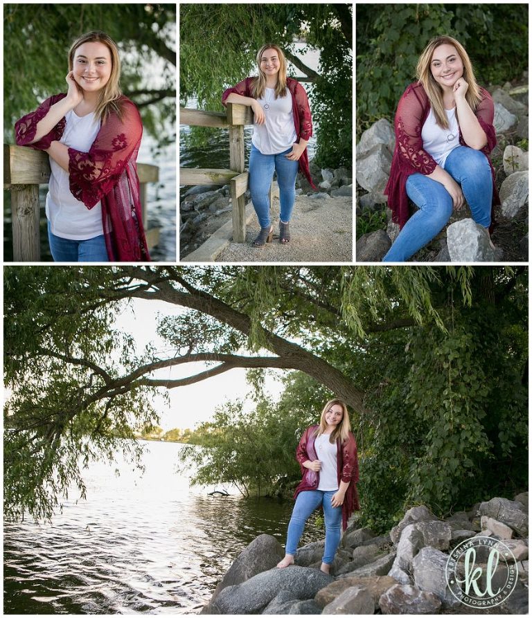 high school senior girl poses for graduation photos on banks of lake cornelia near clarion iowa