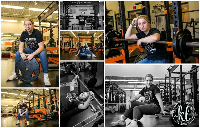 teenage girl poses in weight room for powerlifting senior portraits