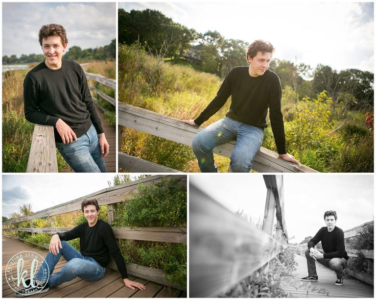 teenage guy posing for photos on wooden bridge at mckusick lake in stillwater minnesota