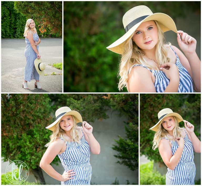 senior pictures with a wide brimmed sunhat in downtown stillwater minnesota