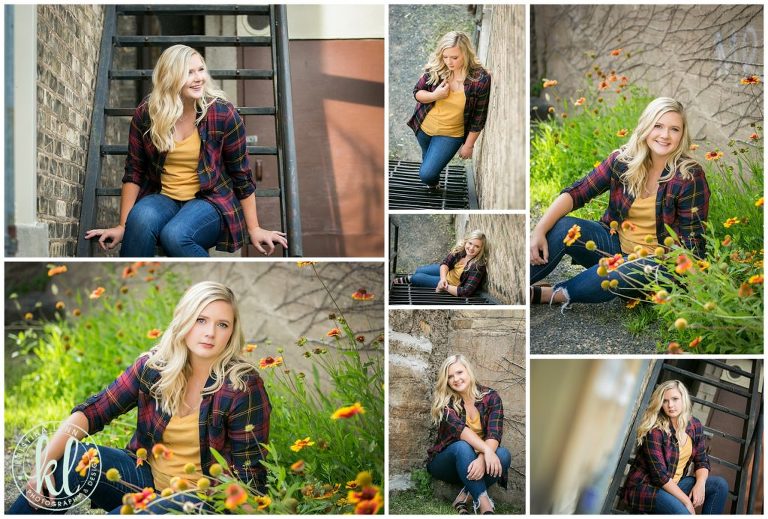 senior pictures in an alleway with colorful flowers in downtown stillwater minnesota