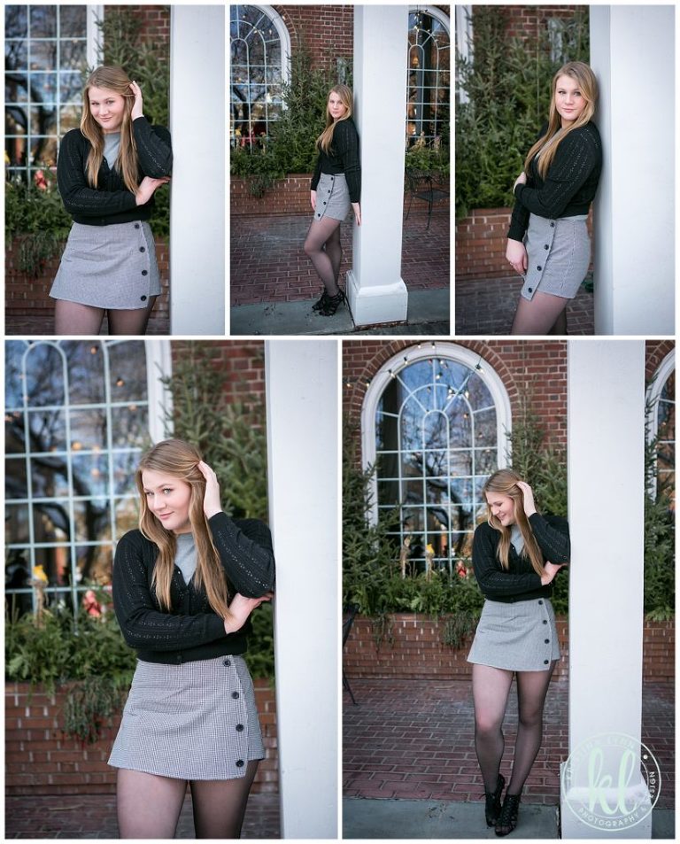 teenager girl leans against a column outside lowell inn in downtown stillwater minnesota