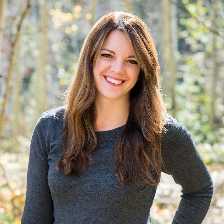 Photo of the Photographer, Kristina Lynn standing in a nature inspired location